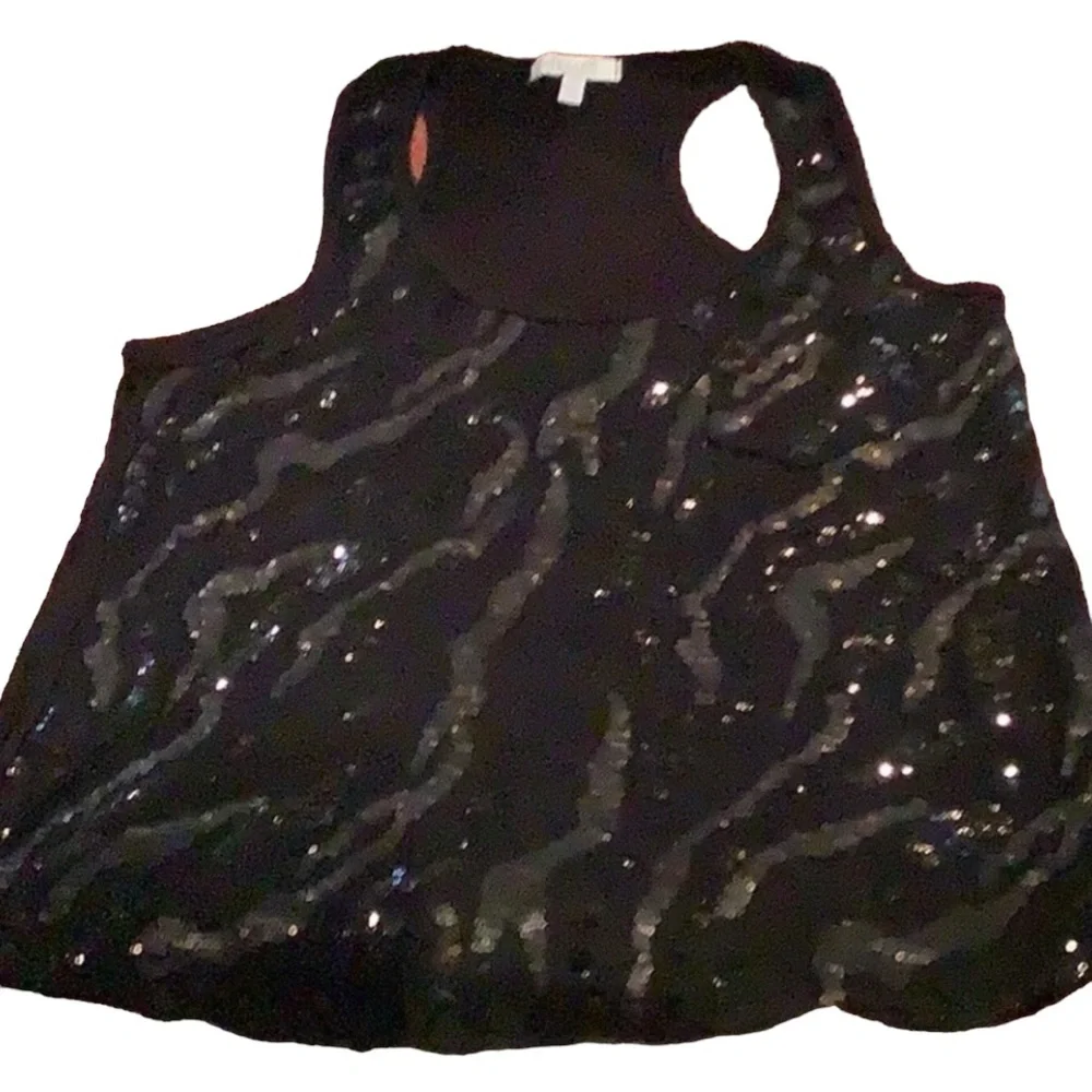 Delia’s small animal print Racer back top, black with sparkles on front